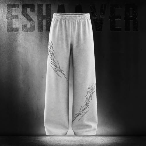 Image of Aesthetic Gothic Wide Leg Pants for Men | Tribal Print Baggy Streetwear | Oversized Track Pants with Elastic Waist | Black and White Relaxed Fit Bottoms