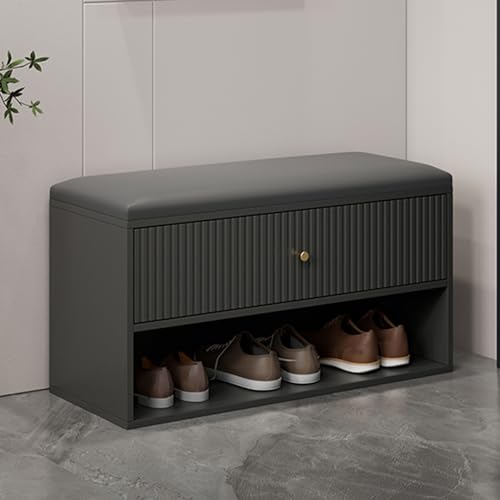 Banc d'appoint d'intérieur noir pour ne plus lacer vos chaussures debout dans une entrée étroite