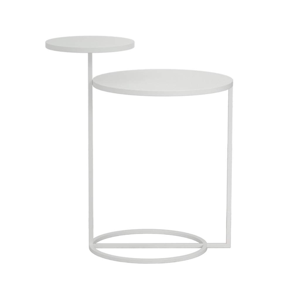 Table basse ronde moderne double bureau pour optimiser l'espace d'un petit salon