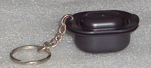 A tiny, dead-serious miniature Tupperware casserole dish on your keychain — absurdist novelty that actually has brand authenticity behind it.