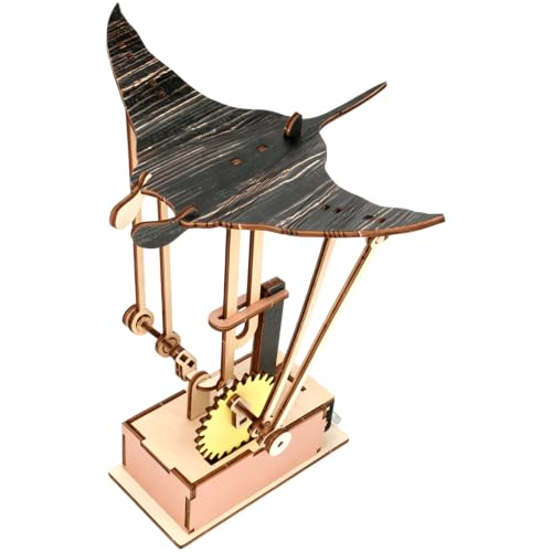A motorized wooden automaton manta ray whose wings flap with eerie, life-like fluid motion — part kinetic sculpture, part mechanical marvel.