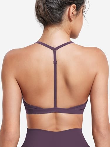 Image of YEOREO CoreFlex Sports Bras for Women Strappy Padded Halter Open Back Light Impact Deep V Neck Yoga Workout Gym Tops