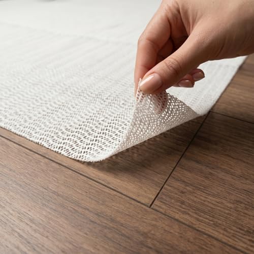 AG HOME 4x6 Non Slip Rug Pad for Area Rugs, 0.06" Thin Low Profile Gripper, Helps Keep Rugs Flat & in Place, Door & Robot Vacuum Friendly, Cuttable Anti Skid Mat for Hardwood, Tile & Laminate Floors by AG Home - Used condition - CA$15.15