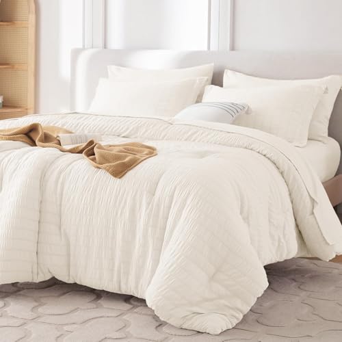 Image of MUXHOMO 7 Pieces King Comforter Set, Seersucker Bed in a Bag King Size, All Season Luxury Bedding Set with Comforter, Flat Sheet, Fitted Sheet, Pillowcases & Shams, Ivory