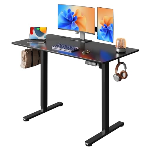 Image of DEVAISE 48 x 24 Inches Electric Standing Desk, Whole-Piece Desktop Standing Desk with Adjustable Height,Cable Holes, 3-Preset Memory Sit Stand up Desk, One-Piece Computer Desk for Home, Office (Black)