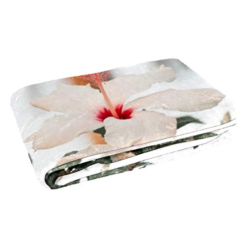 Couverture douce et chaude hibiscus rose pour des soirées cocooning