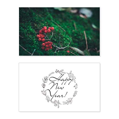 Tarjeta de Año Nuevo: paisaje natural de frutas rojas para desear lo mejor