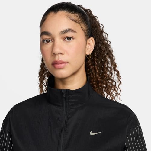 Chaqueta Nike de mujer para correr de noche con seguridad en la ciudad 4