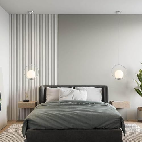 Suspension globe dorée moderne pour illuminer un salon chic