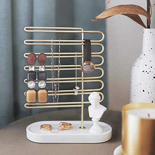 Range-bijoux doré compact pour ne plus jamais perdre vos petites puces