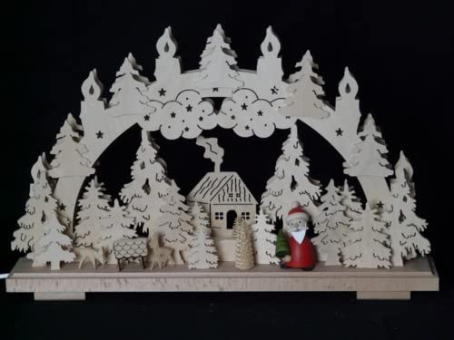 Arche lumineuse Père Noël multicolore au pied du sapin de Noël