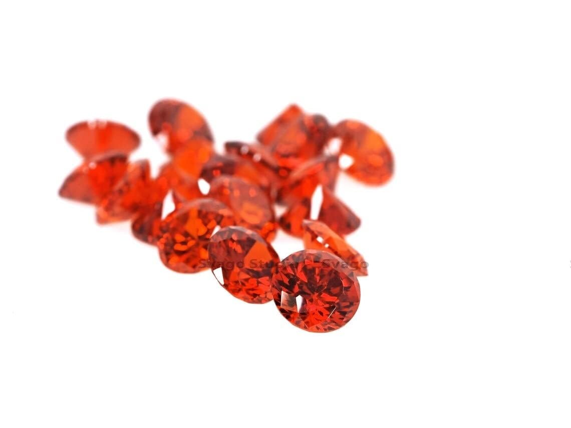 HI International Supply of AAA 8mm to 15mm orange (flame red) round cubic zirconia loose stones. Diamond brilliant cut. Various lot sizes are available. Zircon