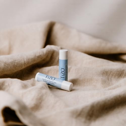TiZO Lip Protection | Tinted | Broad Spectrum Sunscreen | UVA/UVB Protection | For all skin types | Titanium Dioxide and Zinc Oxide | 0.14 oz / 4.5 g