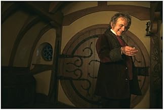 The Lord of the Rings Ian Holm as Bilbo Holding Ring and Smiling 8 x 10 Inch Photo