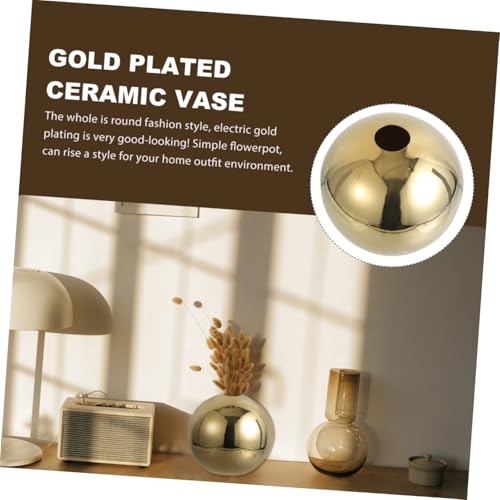 Vase en céramique dorée avec texture créative et forme ronde moderne
