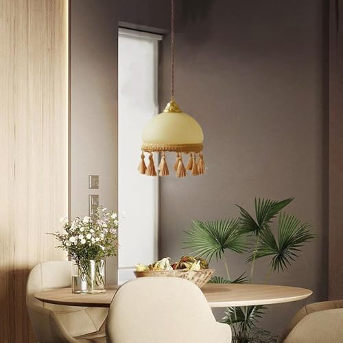 Lustre moderne à pampilles pour illuminer un îlot de cuisine et chambre