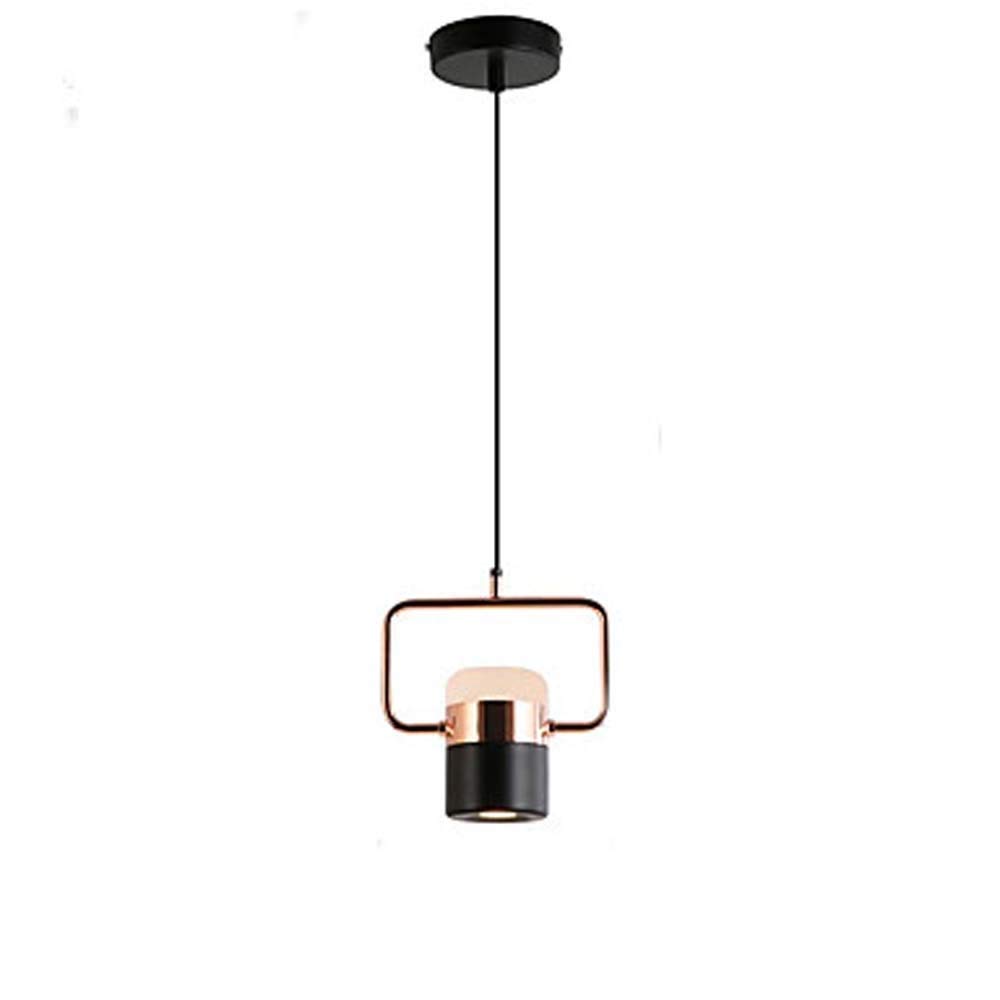 Lámparas cilíndricas led para crear un comedor acogedor con iluminación cálida de diseño negro