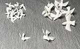 1/2" Plastic Mini Doves 144 Pc These mini decoration doves come in packs of 144 pieces and measure 1/2" from head to tail and they have a 1" wingspan. These mini doves are perfect for scrapbooking of as wedding ornaments and décor.