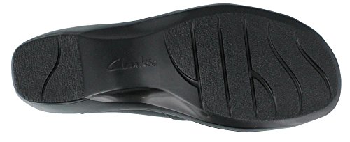 Clarks womens May Marigold Slip On Loafer, Black Leather, 9.5 US A group of women wearing the loafers in different colors and styles, illustrating their adaptability to various occasions