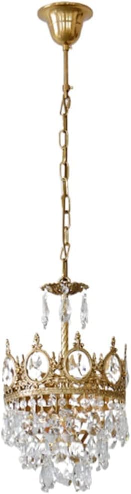 Lustre en cristal moderne dorée pour une chambre cocooning et cosy