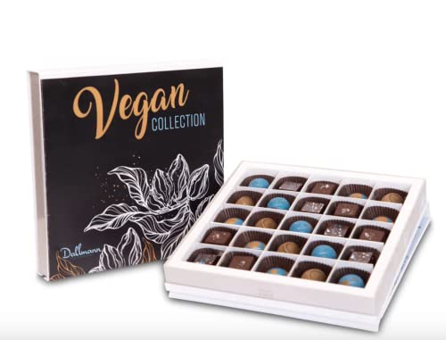 An open box of dairy-free chocolates on a wrapped gift table