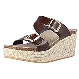 Genuins braune Ledersandale mit Plateau. Zwei verstellbare Riemen mit Metallschnallen auf dem Rist. Anatomische Einlegesohle aus weichem Kork, bezogen mit grauem Spaltleder. Mit geflochtener Naturjute ausgekleidetes Plateau, 7 cm hoch und 2,5 cm an der Vorderseite.