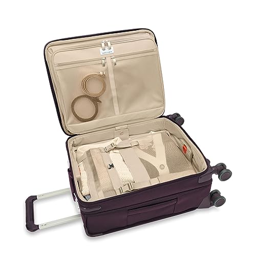Image of Briggs & Riley 21 inch Global Carry On Expandable Spinner - Luggage for International Travel, Suitcases with Wheels, Softside Rolling Bag for Men & Women, Self-Repairing Zipper - Baseline Collection, Plum