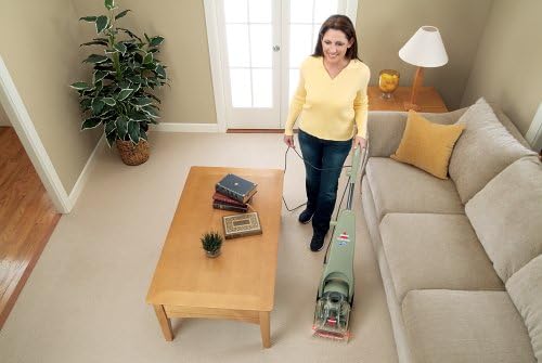 Woman operating BISSELL QuickSteamer from an overhead view