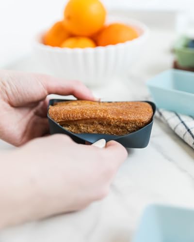 Image of The Silicone Kitchen Silicone Individual Mini Loaf Pans - Reusable, Non-Toxic, BPA Free, Dishwasher Safe, Bento Box Accessories (12 Pack, Navy, White, Blue, Green)