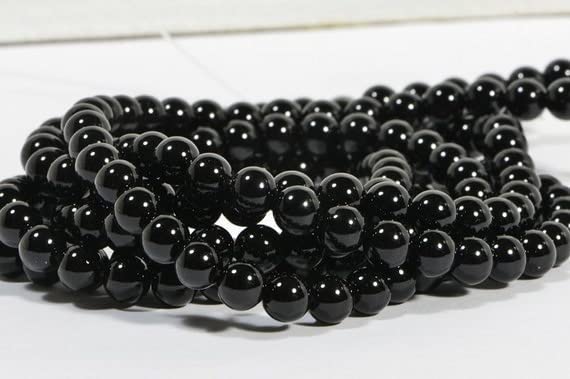 Perles Onyx Noir 6.4mm en fil de 38cm pour la création de bijoux