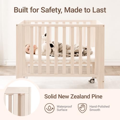 Image of MAMAZING EvoNest 6-in-1 Convertible Baby Mini Crib with Wheels | GREENGUARD Gold Certified, New Zealand Pine Wood, 4 Adjustable Heights, Rocking Mode, Small Spaces Design, Washed Natural