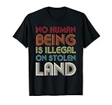 No Human Being Is Illegal On Stolen Land Pro Immigrant T-Shirt