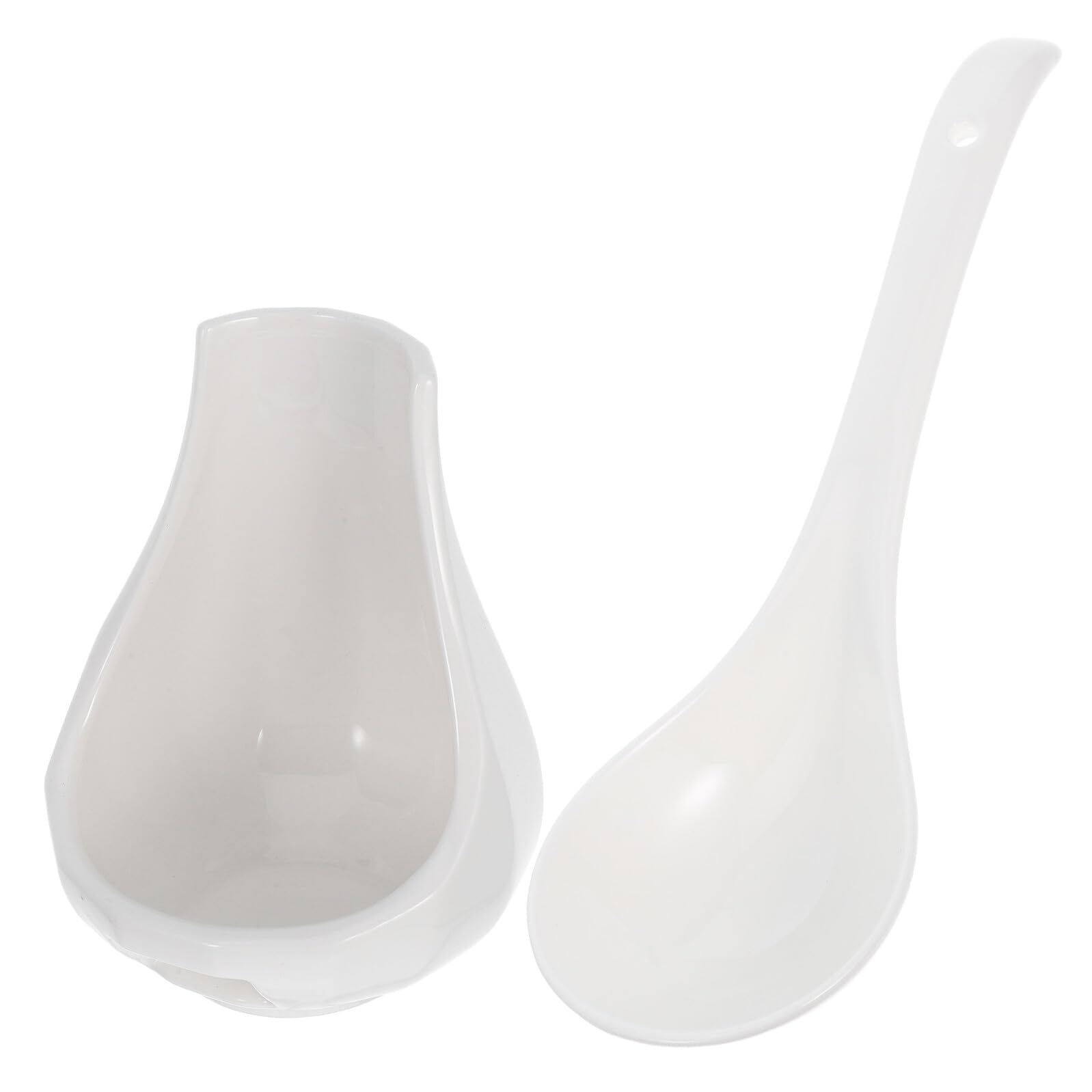 Cuillère à soupe céramique et support blanc pour éliminer les taches de sauce sur la nappe