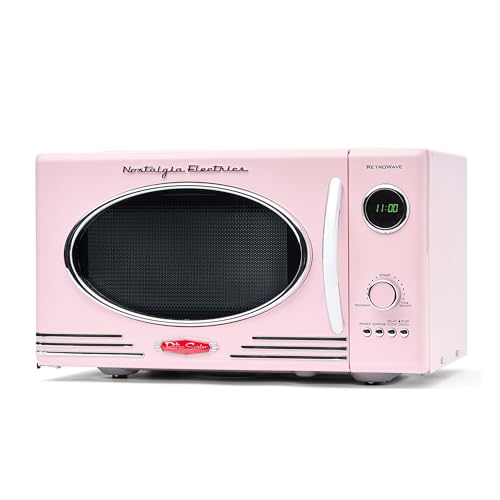Nostalgia Countertop Microwave Oven with Easy Clean Interior - Retro Microwave with LED Display & Child Lock- Compact 0.9 Cu. Ft. Oven With 12 Pre-Programmed Settings for Quick Cooking- 800-Watts-Pink by Nostalgia - Used condition - US$120.53
