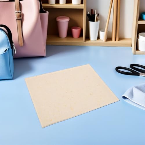 Coussin isolant en caoutchouc mousse pour opérations de pressage
