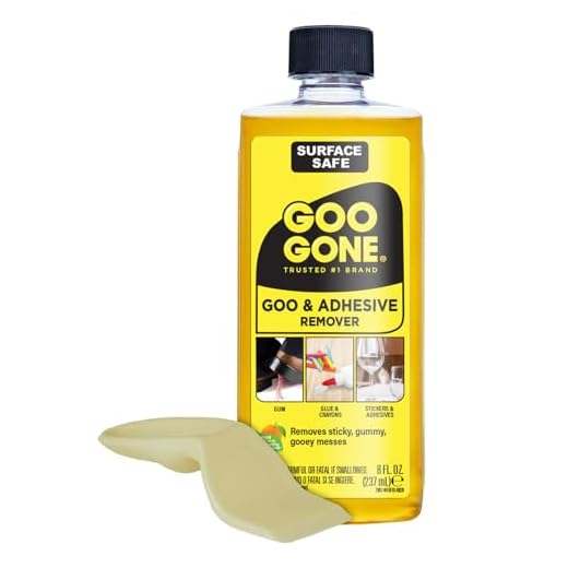 Goo Gone Original Liquid - 8 Ounce and Sticker Lifter - Surface Safe Adhesive Remover Safely Removes Stickers Labels Decals Residue Tape Chewing Gum Grease Tar Crayon Glue