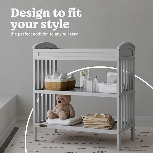 Image of Graco Benton Changing Table with Bonus Water-Resistant Changing Pad (Pebble Gray) - GREENGUARD Gold Certified, Includes Diaper Change Pad with Safety Strap, 2 Open Storage Shelves for Organizing