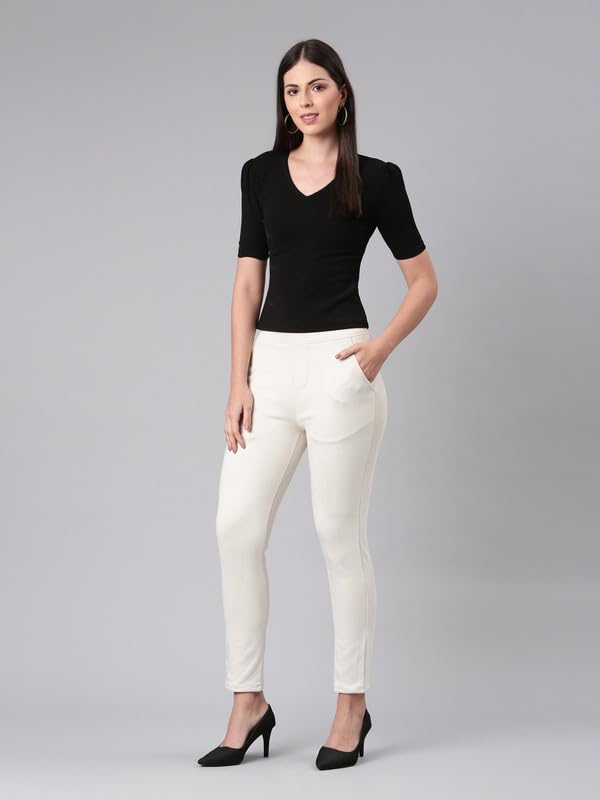 Image of GO COLORS Women Solid Mid Rise Suede Treggings