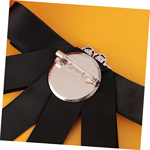 Broche bowknot en strass idéale sur une cape pour les soirées
