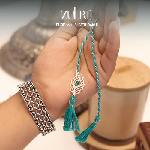 Image of 92.5 Sterling Silver Peacock Feather with Stone Thread Rakhi For Rakshabandhan | Rakhi With Fragrance Greeting Card & Roli Chawal and Silver Certificate of Authenticity