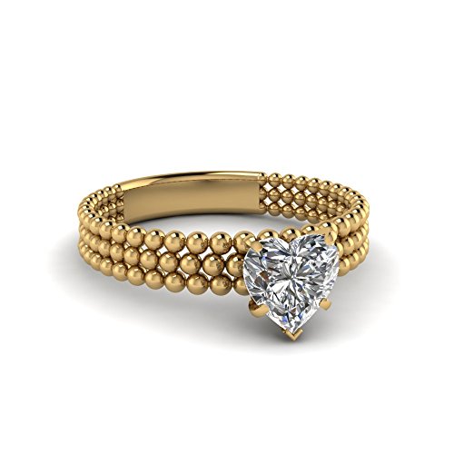Bague solitaire en cœur pour sceller votre promesse d'amour lors d'une soirée inoubliable
