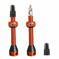 Side outlets 4 holes for air passage improved even with the use of tyre inserts. Tubeless valves, length 50 mm. anodized in ten colors, or brass in black color
