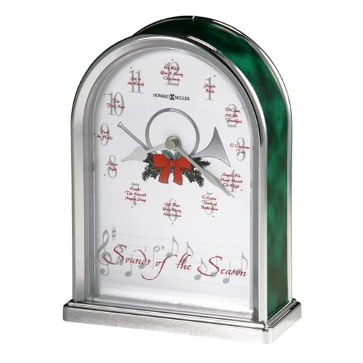 Howard Miller Sounds of The Season Christmas Table Clock 645-687 – Polished Silver Finish, Green Marble Tone Sides, Musical Timepiece with 12 Carols, Modern Home Décor, Quartz Movement