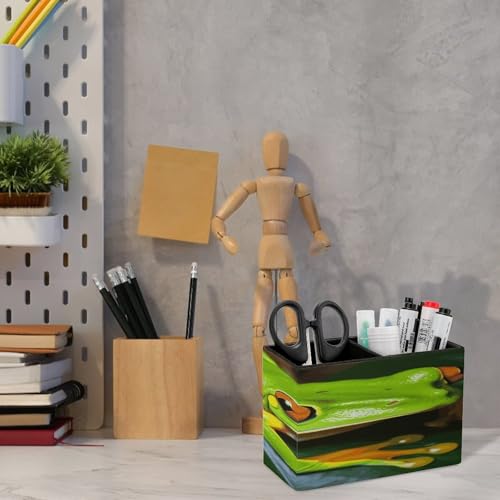 Crayons et pinceaux enfin ordonnés grâce au porte-stylos de bureau en cuir vert