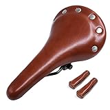 Das vintage Rennradsattel ist mit schwarzem oder braunem Leder bezogen und mit silbernen Metallnieten versehen. Es zeigt modisch die Kunst des Radfahrens über die Jahrzehnte.