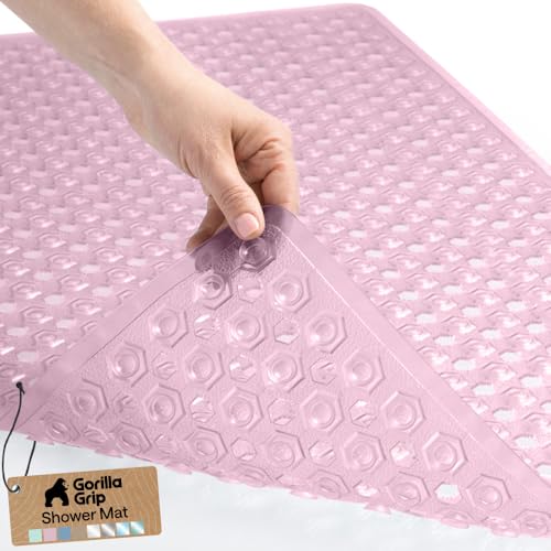 Image of GORILLA GRIP Patented Bath Tub Shower Mat, Machine Washable Bathtub Floor Liner Mats, Suction Cups and Drain Holes to Keep Tubs Clean, Soft on Feet, Bathroom Essentials, 35x16 Inch, Clear Light Pink