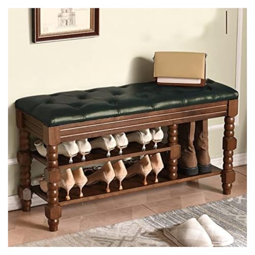 Banc à chaussures en cuir vert pour optimiser une petite entrée encombrée grâce au rangement bas