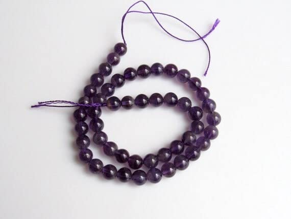 Perles d'améthyste naturelle ronde 8mm fil de 38cm pour création de bijoux