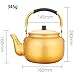 hervidor de agua de aluminio amarillo con tapa Imagen de hervidor de agua de aluminio amarillo con tapa