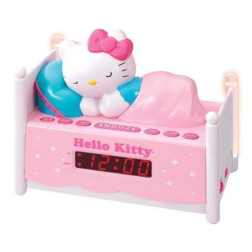 Officially Licensed Hello Kitty KT2052 Alarm Clock Radio with Bed Post NIGHT LIGHTS! Wake to Radio or Alarm ~ Large, Easy to Locate Snooze Button ~ Two Bedposts Light Up for Night Light (On/Off Switch) ~ Built in cord ~ Battery Backup ~ This pink alarm clock radio is a great gift for girls of any age